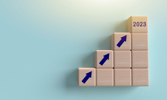 Cube wooden block arrow 2023 number text happy new year time calendar copy space symbol decoration business strategy idea vision plan vision achievement financial marketing investment growth.3d render photo