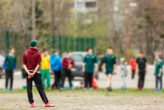 Coach stands in front of his students and gives instructions before training. photo