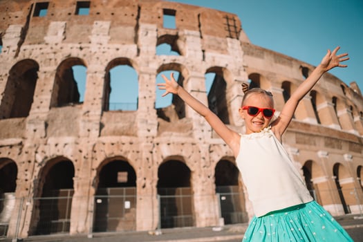 Little girl in front of colosseum in Rome, Italy photo