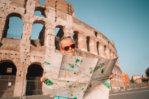 Little girl in front of colosseum in Rome, Italy photo