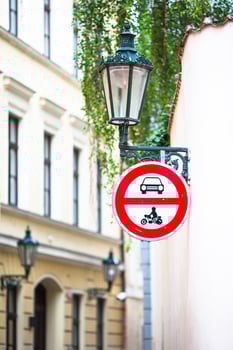 Old narrow street in Europe. District of the city of Prague, Czech Republic, and one of its most historic regions. photo
