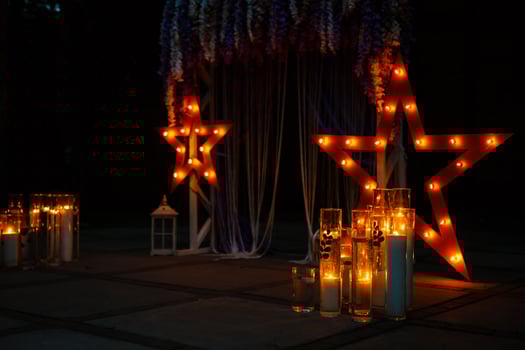 Decorative star with lamps on a background of wall. Modern grungy interior photo