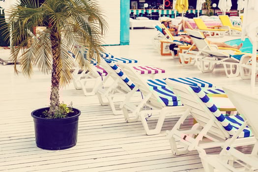 Blue deck chairs at the swimming pool photo