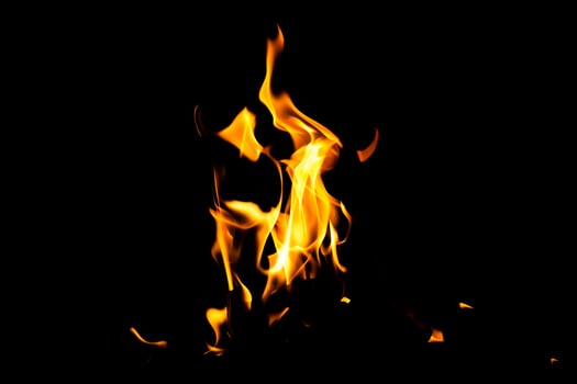 Fire flame texture. Burning material backdrop. Burn effect pattern. Blaze and torch wallpaper. Heat and haze backdrop. photo