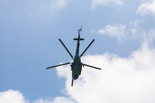 Flying helicopters in the sky. photo