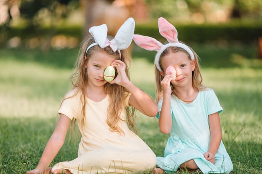 Portrait of kid with easter busket with eggs outdoor photo