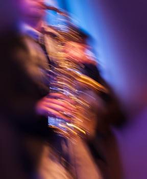 Saxophone player performing on stage photo