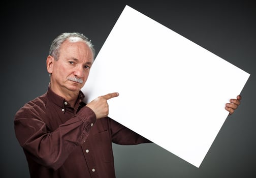 man holding billboard photo