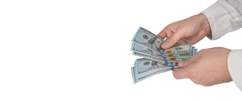 Man counting money, USD cash. Allocation of money, economy concept, falling or rising dollar photo