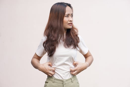 Woman suffer from stomachacheChronic gastritis Abdomen bloating concept photo