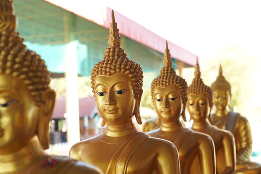 Golden Buddha statue in Thailand temple photo