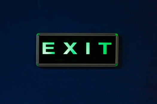 Inscription exit on a blue background photo