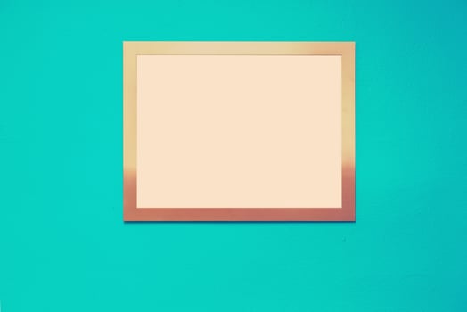 Empty picture frame on a bright solid background photo