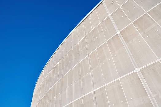 Modern building detail against blue sky. Abstract architecture background photo