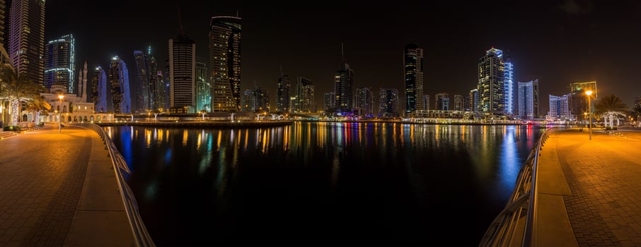View of the skyscrapers of Dubai Marina district at night photo