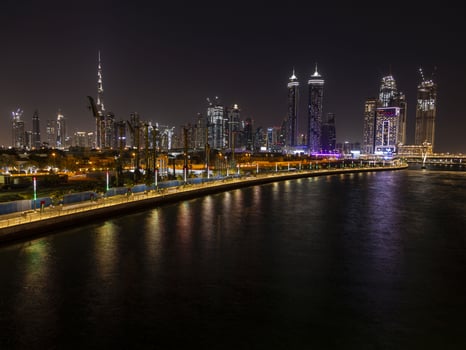 Skyline of Dubai at night photo