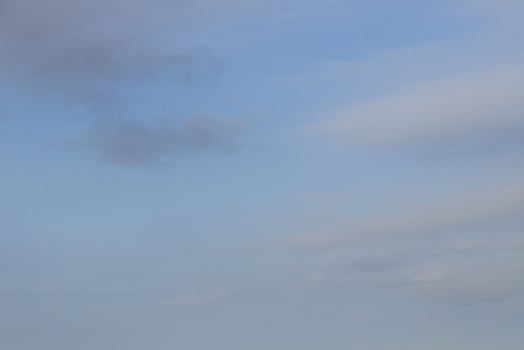 Image of a partly cloudy and partly clear sky during the day photo