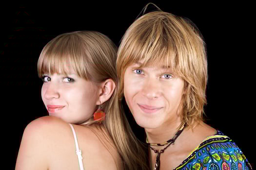 Portrait of the young beauty couple. Isolated on black photo