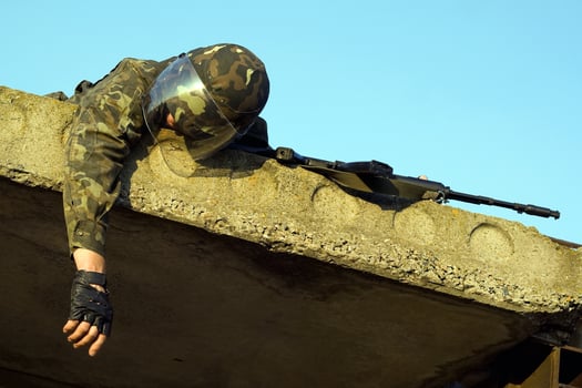 Army soldier with machine gun photo