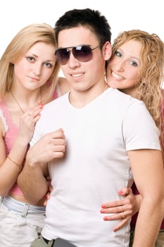 Portrait of a two smiling blonde women with young man photo