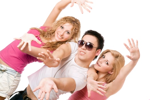Portrait of two smiling blonde with handsome young man photo
