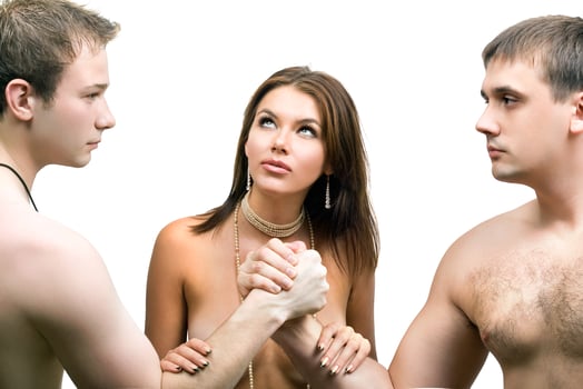 Two men are fighting for a woman photo
