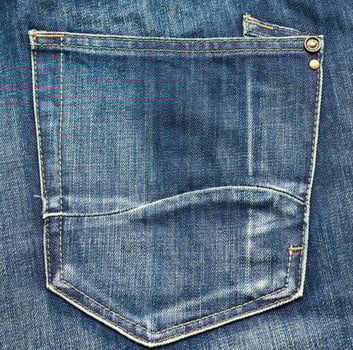 back pocket of blue jeans, full frame photo