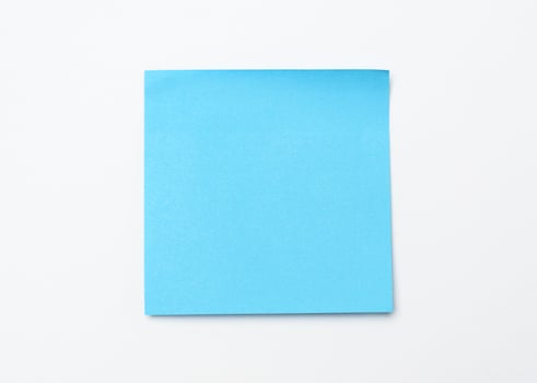 blue square sticker on white surface photo
