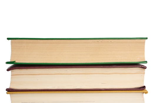 stack of various books, items are isolated on white background photo