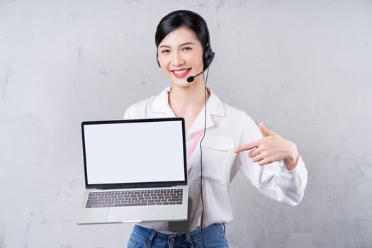 Portrait of young Asian operator on background photo
