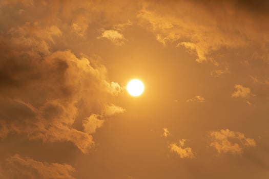 The sun in the yellow sky photo