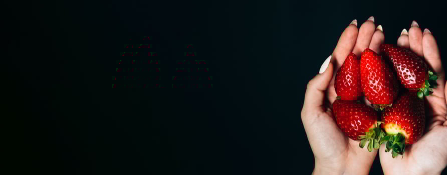 strawberry berries in women 's hands. space for your text photo