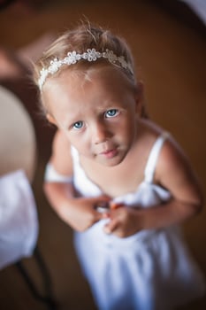 Little girl with white dress for wedding photo