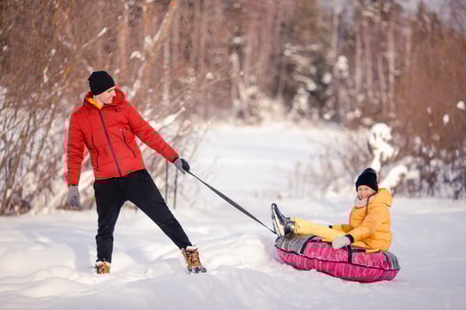 Family of dad and kids vacation on Christmas eve outdoors photo