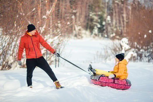 Family of dad and kids vacation on Christmas eve outdoors photo