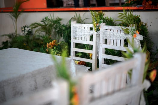 Table and Chairs Decoration Arrangement for a Traditional Wedding Ceremony in Indonesia photo