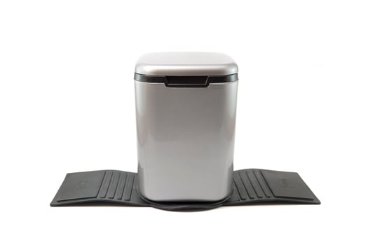 mini car dustbin isolated on a white background photo