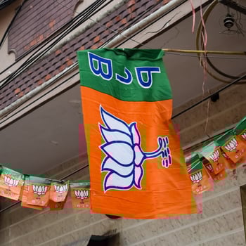 Delhi, India, December 02 2022 - Bharatiya Janata Party BJP supporter during mega road show in support of BJP candidate Pankaj Luthara to file nomination papers ahead of MCD local body Elections 2022 photo