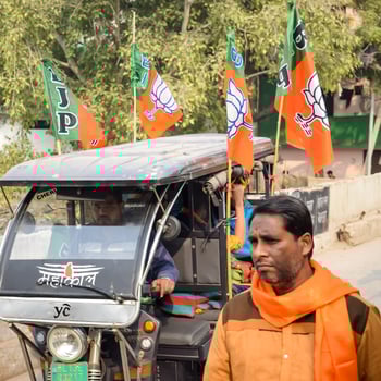 Delhi, India, December 02 2022 - Bharatiya Janata Party BJP supporter during mega road show in support of BJP candidate Pankaj Luthara to file nomination papers ahead of MCD local body Elections 2022 photo