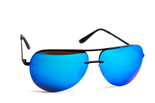 Golden sunglasses blue mirror lenses isolated on white background photo