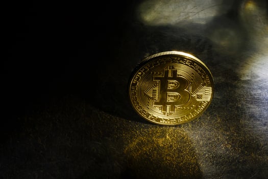 Golden bitcoins with the spotlight photo