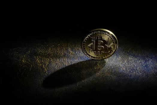 Golden bitcoins with the spotlight photo