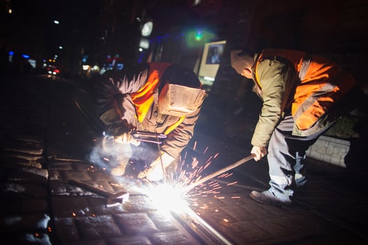 workers who perform work on welding metal and repair photo