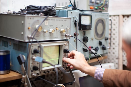 engineers work with electrical measuring devices photo