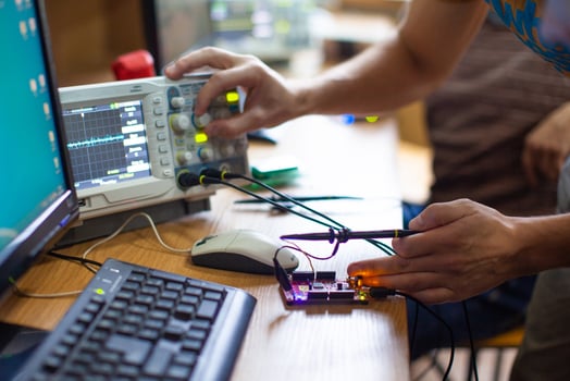 engineers work with electrical measuring devices photo