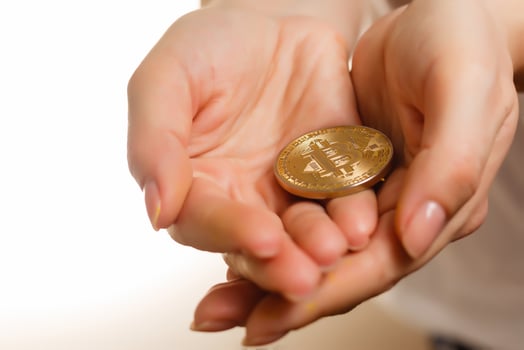The money coin on hands or coins exchange in stock market photo