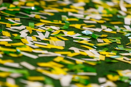 Celebration Flat lay with colorful party items on green background. photo