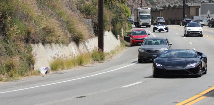 brandless sports cars on the road photo
