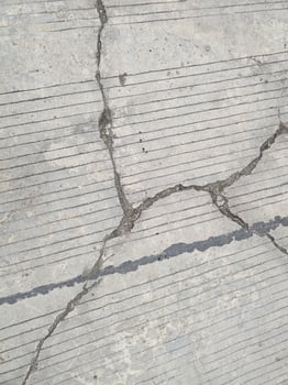 road wall texture background with lines and cracks photo