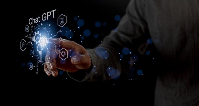 Businessman holding a light chatbot icon. Chat GPT AI or Artificial intelligence using chatbot generate photo